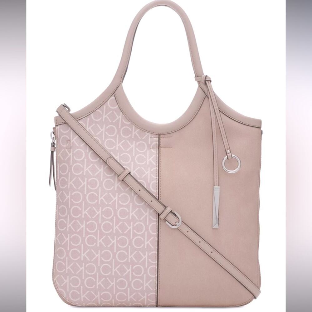 NWT MSRP$158 CALVIN KLEIN
Gabrianna Slim Tote Zipped around